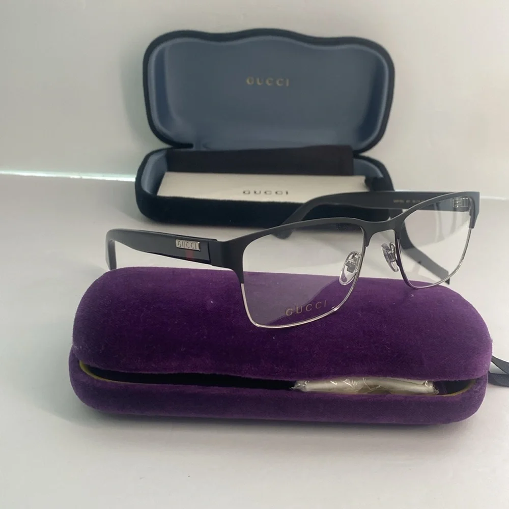 GUCCI GG0750O 001 square optical matte black and silver with shiny black frame.